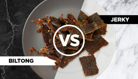 Biltong beef strips being shown next to regular beef jerky to show the difference in texture and shape